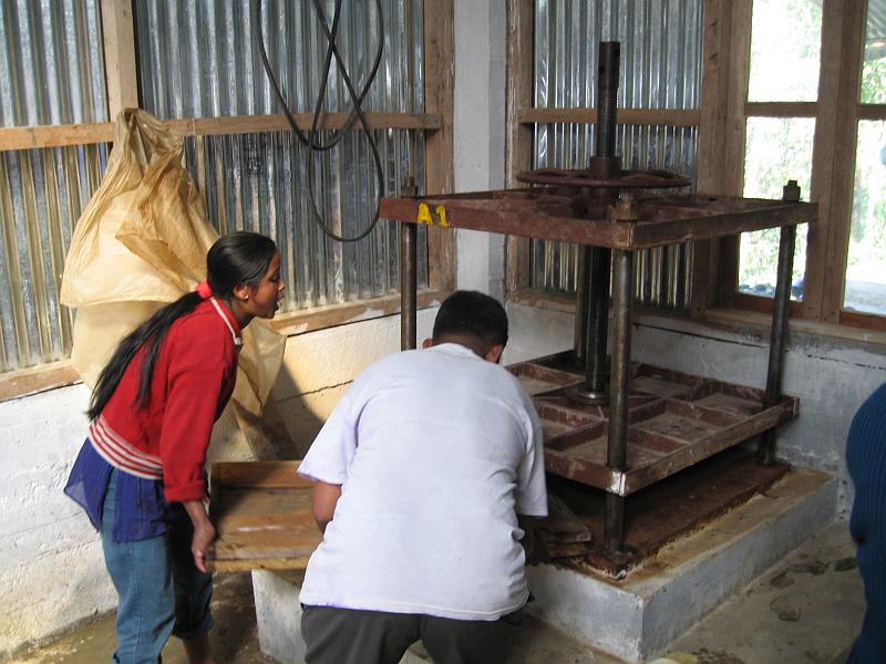 IMG_2888.JPG - A stack of sheets are then put into this press, to expel the water and get the pulp fibers to bond.