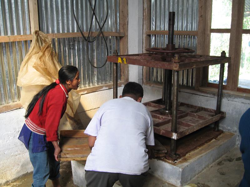 IMG_2888.jpg - A stack of sheets are then put into this press, to expel the water and get the pulp fibers to bond.