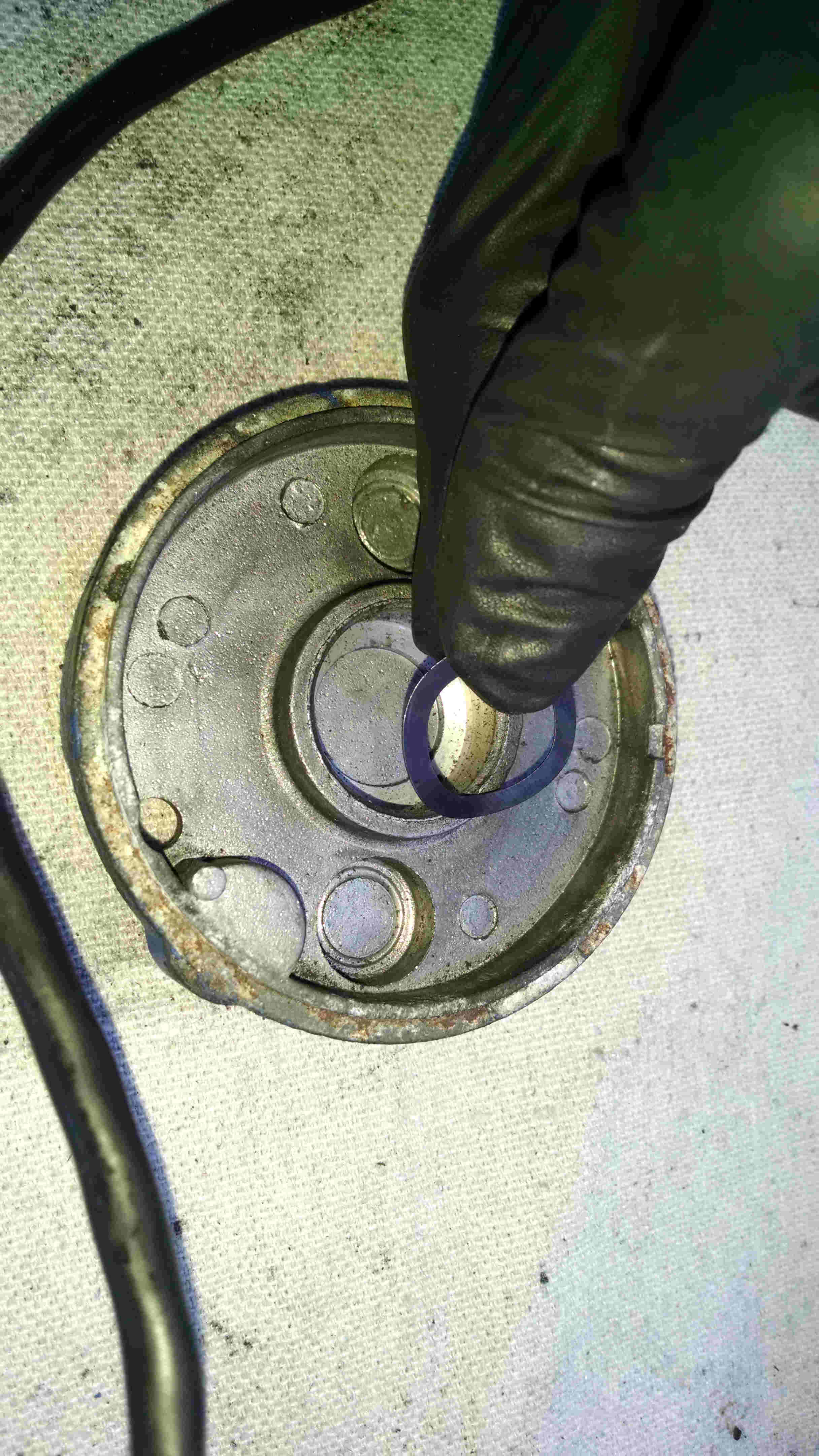 Putting the compression spring in the end cap